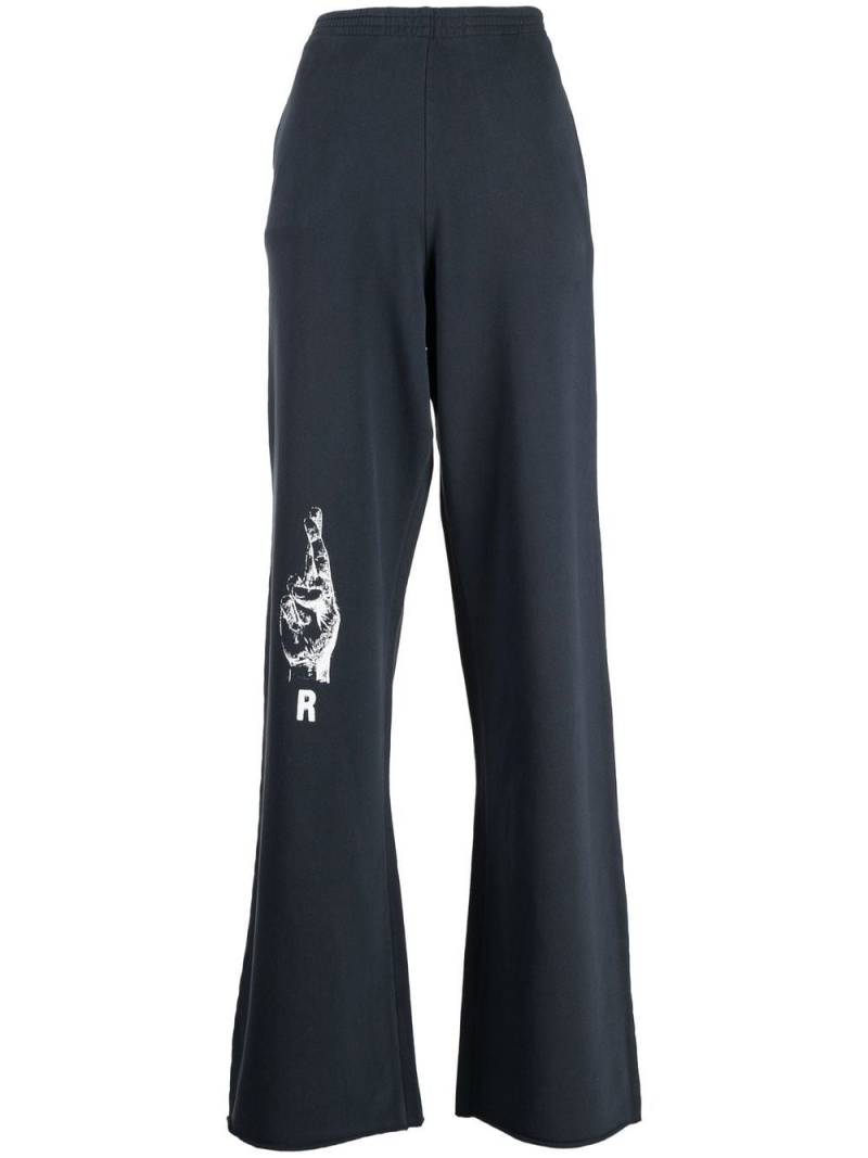 Raf Simons Hand Sign-print flared track pants - Blue von Raf Simons