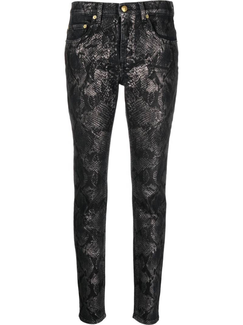 Roberto Cavalli python print slim-fit trousers - Black von Roberto Cavalli