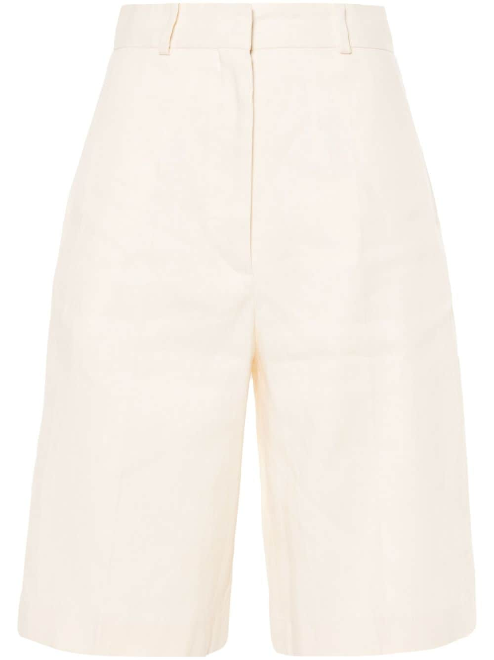 SANDRO pressed-crease knee-length shorts - Neutrals von SANDRO