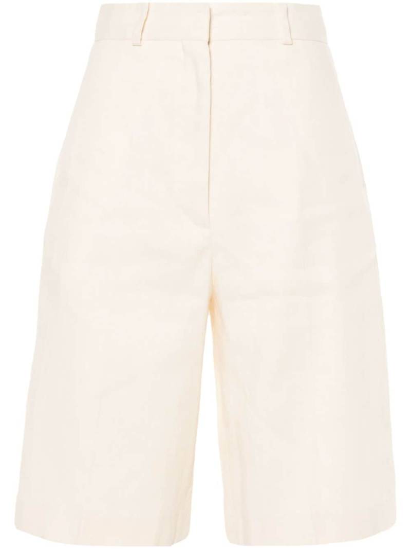 SANDRO pressed-crease knee-length shorts - Neutrals von SANDRO