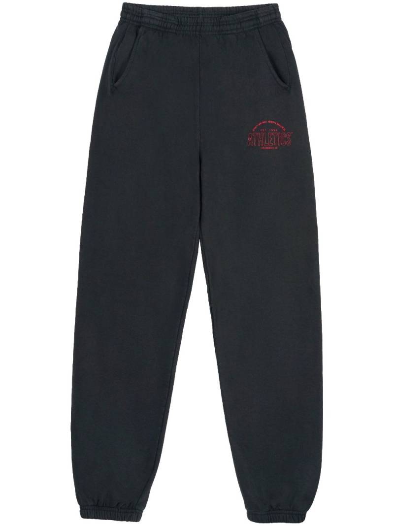 Sporty & Rich Athletics motif-print track trousers - Black von Sporty & Rich