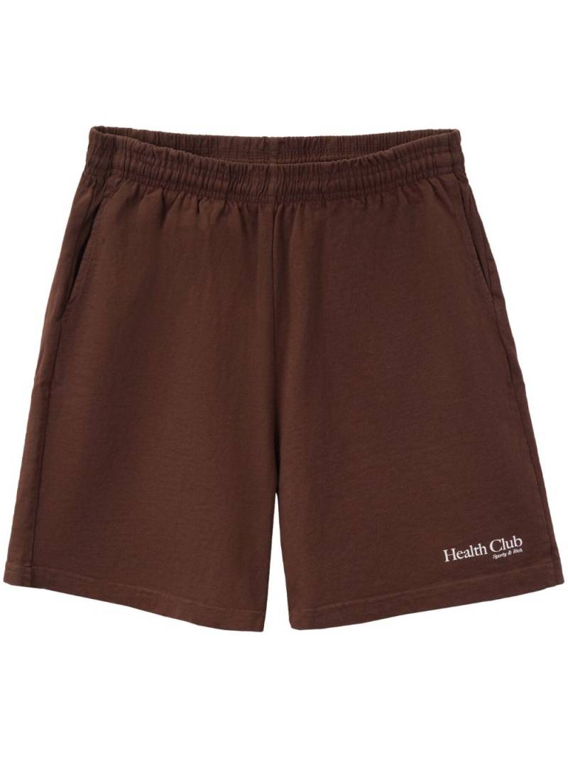 Sporty & Rich Health Club logo-print shorts - Brown von Sporty & Rich