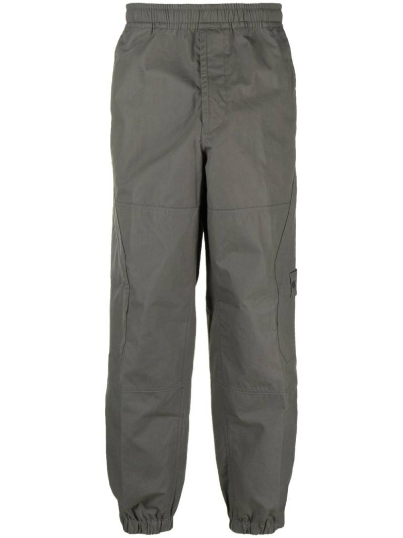 Stone Island Compass-motif cotton tapered trousers - Grey von Stone Island