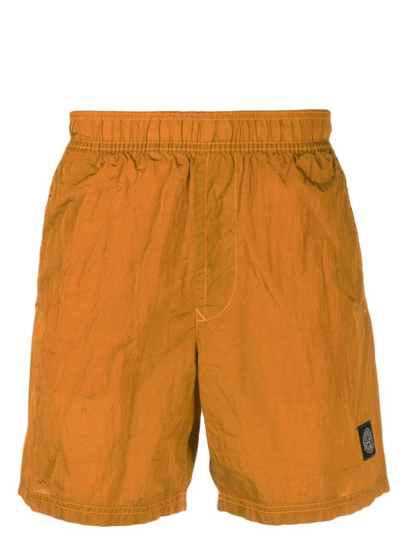 Stone Island embroidered-logo swim shorts - Orange von Stone Island