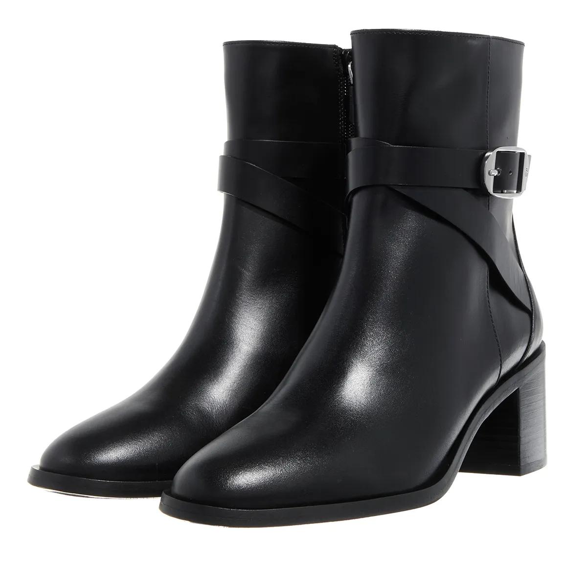 Stuart Weitzman Stiefel & Boots - Esme Belted Zip Bootie - Gr. 37 (EU) - in Schwarz - für Damen von Stuart Weitzman