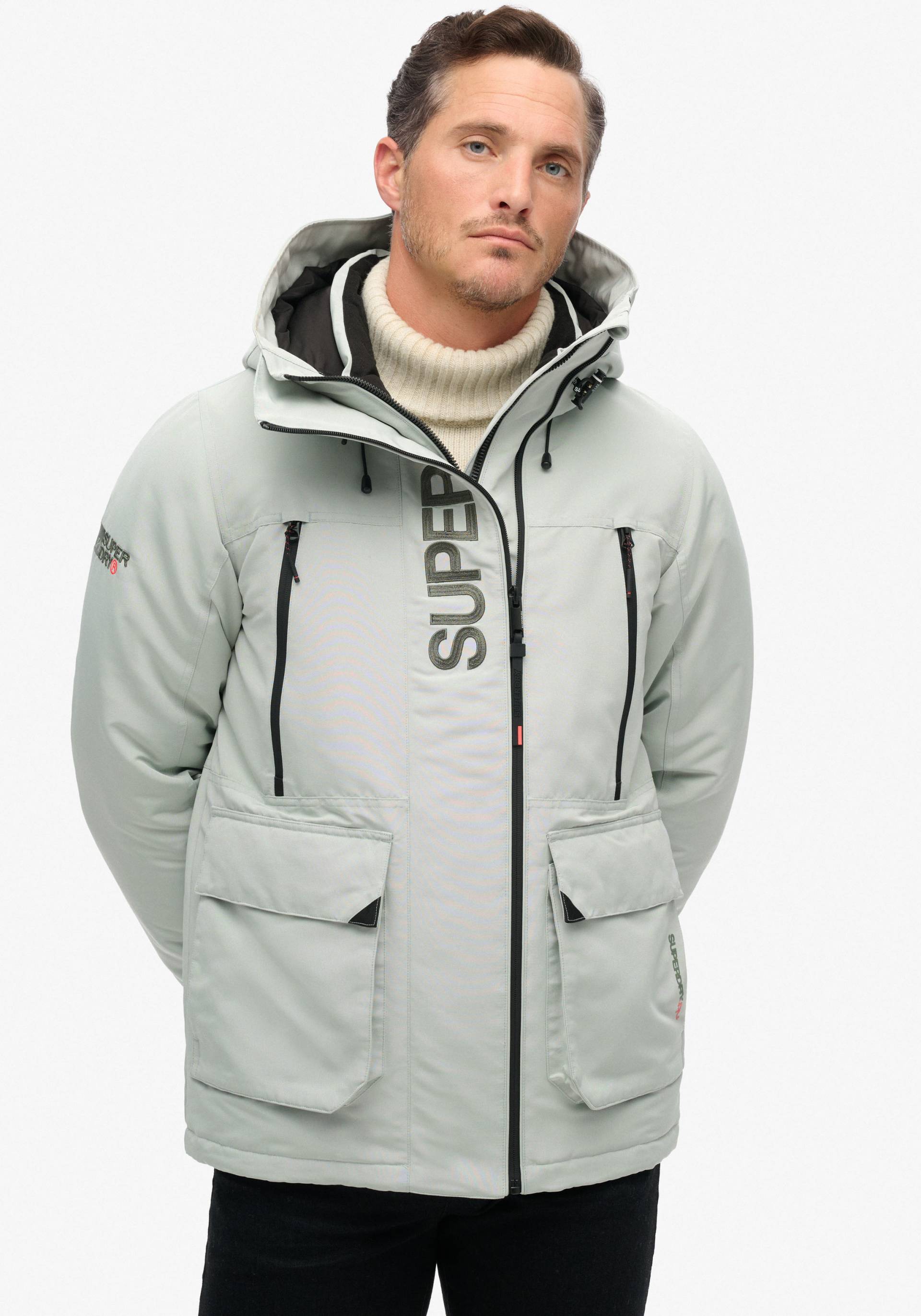 Superdry Outdoorjacke »HOOD ULTIMATE EMB WINDBREAKER«, mit Kapuze Superdry Outdoorjacke »HOOD ULTIMATE EMB WINDBREAKER«, mit Kapuze von Superdry