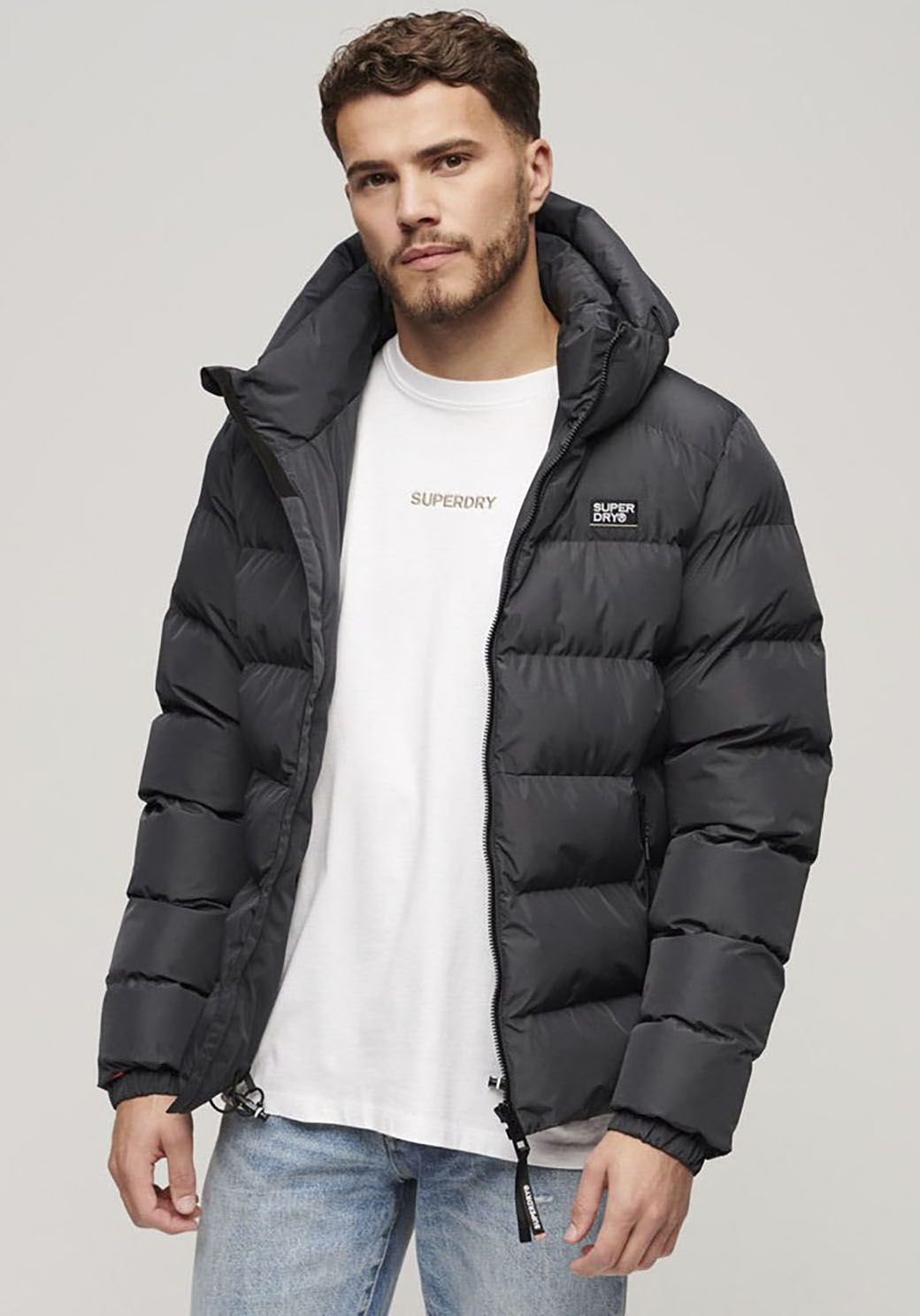 Superdry Steppjacke »HOODED SPORTS PUFFER JACKET«, mit Kapuze Superdry Steppjacke »HOODED SPORTS PUFFER JACKET«, mit Kapuze von Superdry