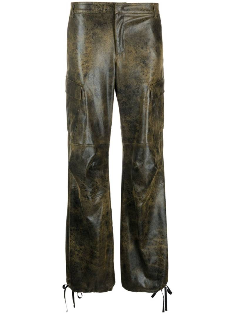 THE ANDAMANE distressed-effect tapered trousers - Black von THE ANDAMANE