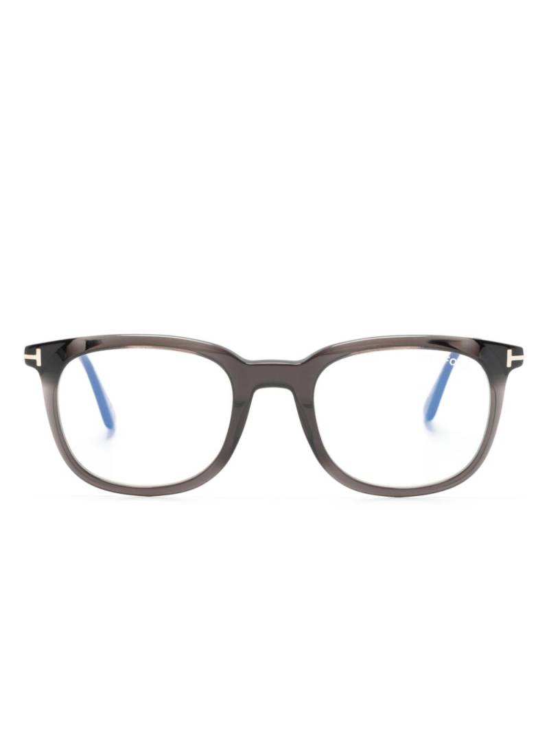 TOM FORD Eyewear logo-plaque round-frame glasses - Black von TOM FORD Eyewear