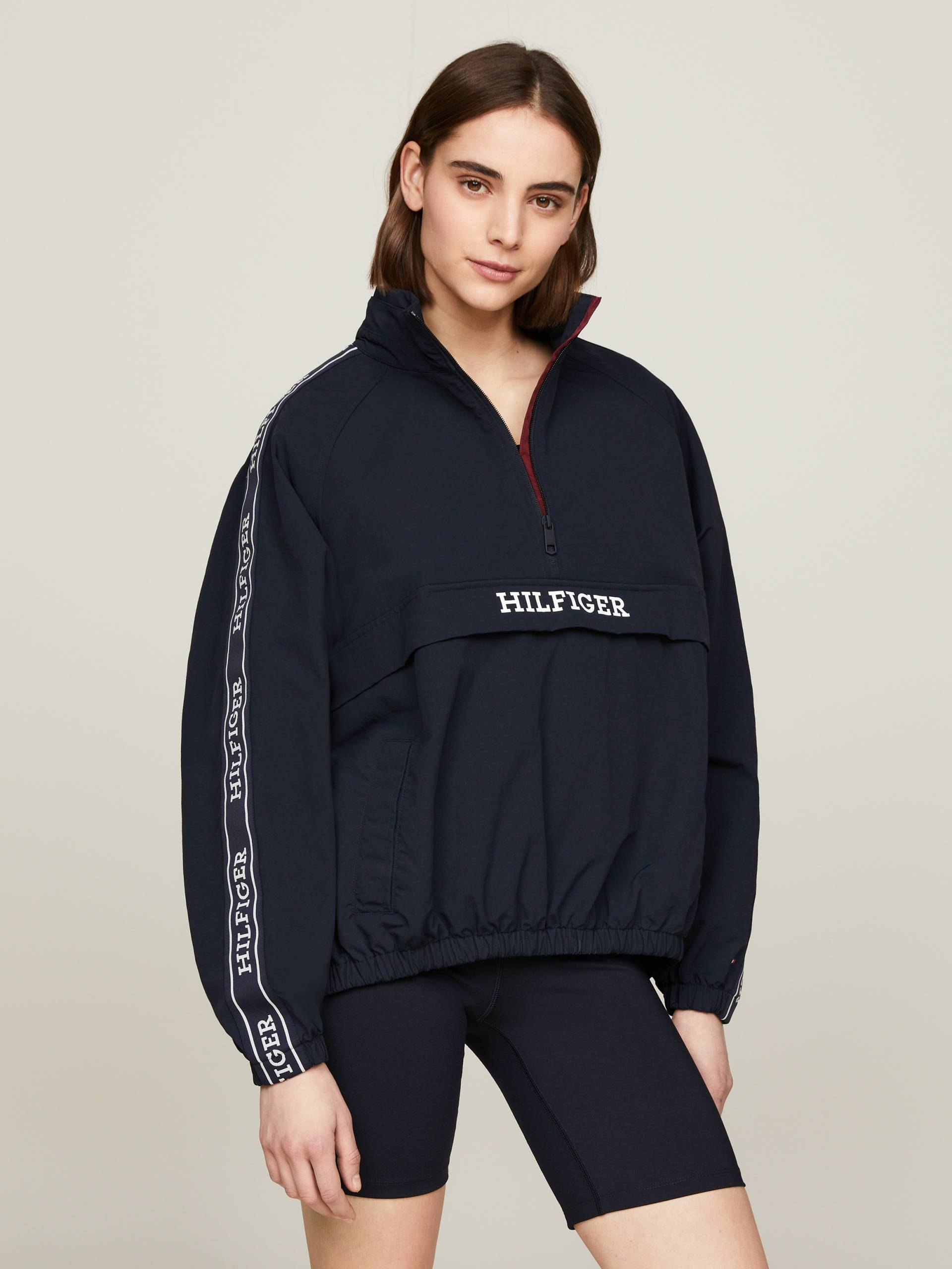 Tommy Hilfiger Outdoorjacke »MONOTYPE TAPE RLX 1/2 ZIP JACKET«, mit Logo-Tape von TOMMY HILFIGER