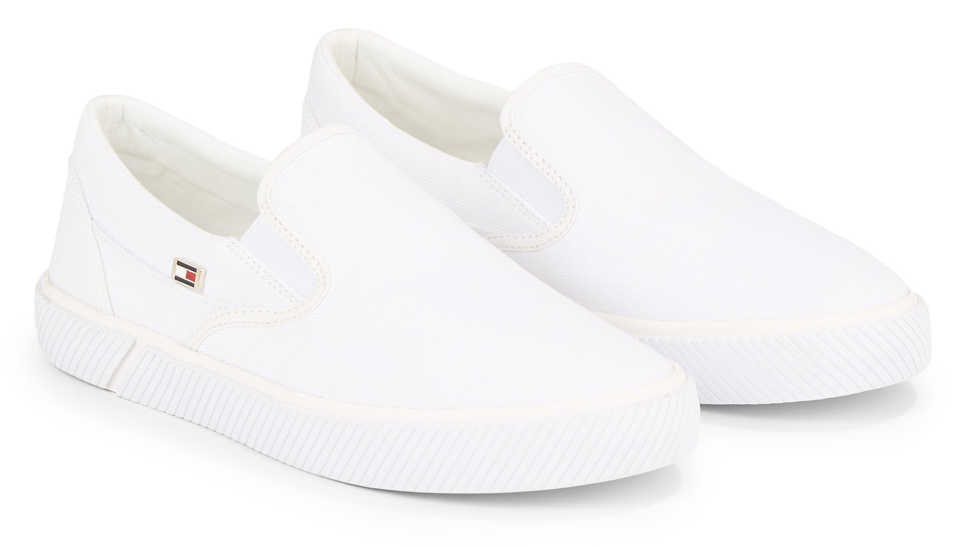 Tommy Hilfiger Slip-On Sneaker »VULC CANVAS SLIP-ON SNEAKER«, Slipper, Freizeitschuh, Sommerschuh mit seitlichen Stretcheinsätzen von TOMMY HILFIGER