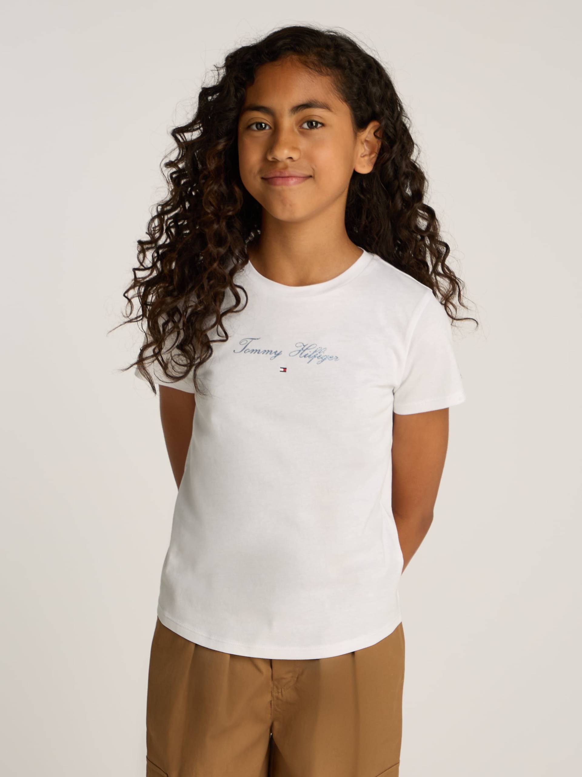Tommy Hilfiger T-Shirt, mit glitzerndem Schriftzug Tommy Hilfiger T-Shirt, mit glitzerndem Schriftzug von TOMMY HILFIGER