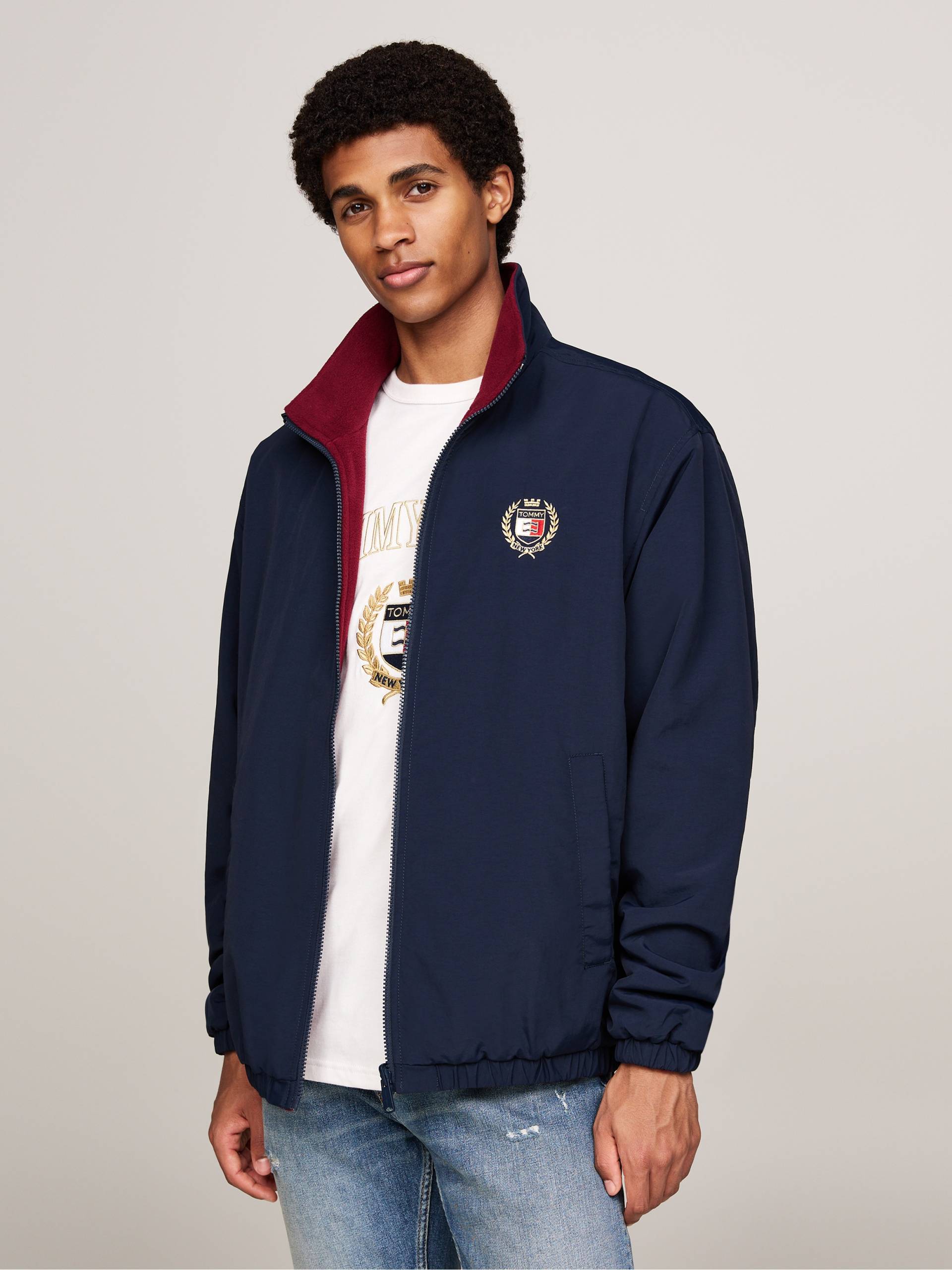 Tommy Jeans Windbreaker »TJM POLAR CREST REVERSE JKT EXT«, Stickerei auf Brusthöhe Tommy Jeans Windbreaker »TJM POLAR CREST REVERSE JKT EXT«, Stickerei auf Brusthöhe von TOMMY JEANS