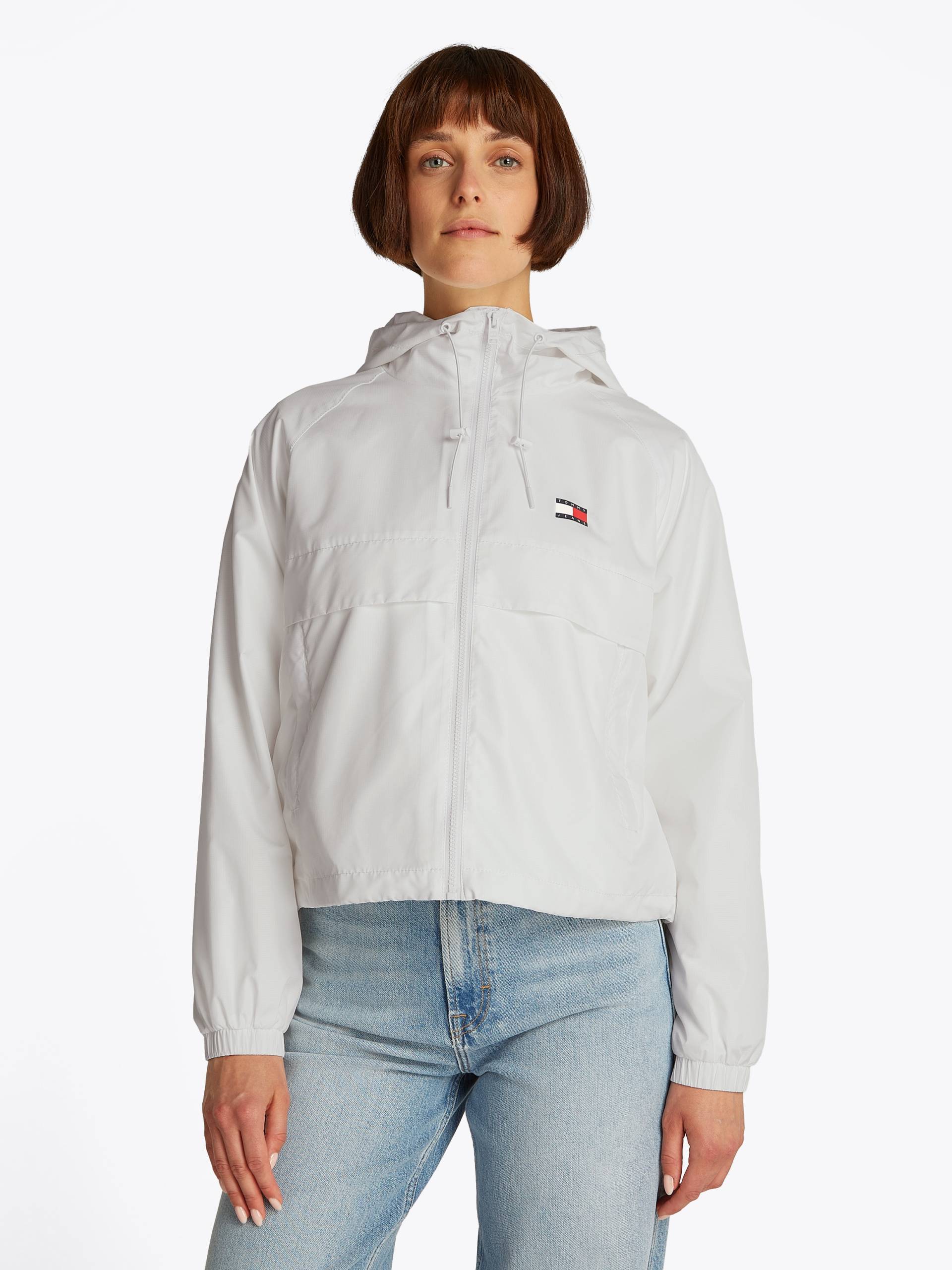 Tommy Jeans Windbreaker »TJW ESSENTIAL WINDBREAKER EXT«, mit Kapuze, mit Logodruck von TOMMY JEANS