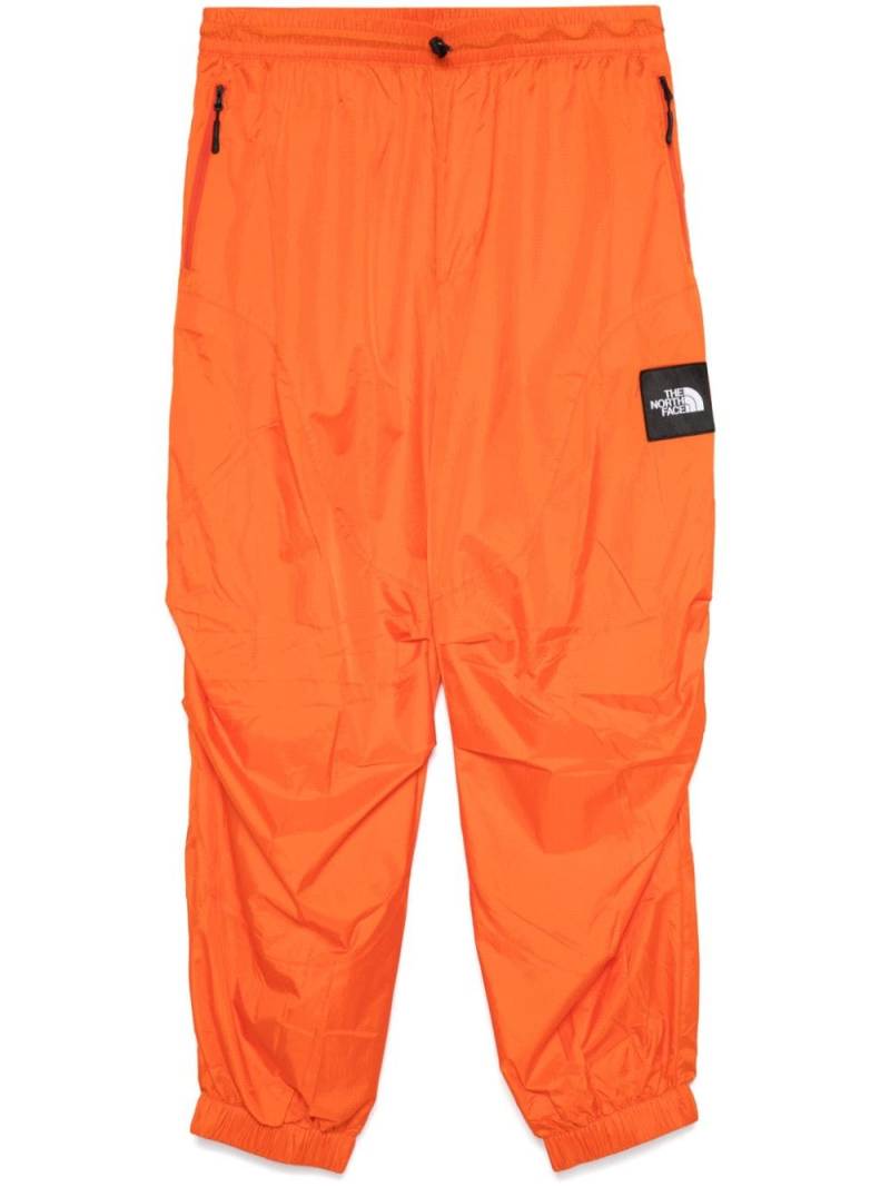 The North Face X Yinka Ilori windproof trousers - Orange von The North Face