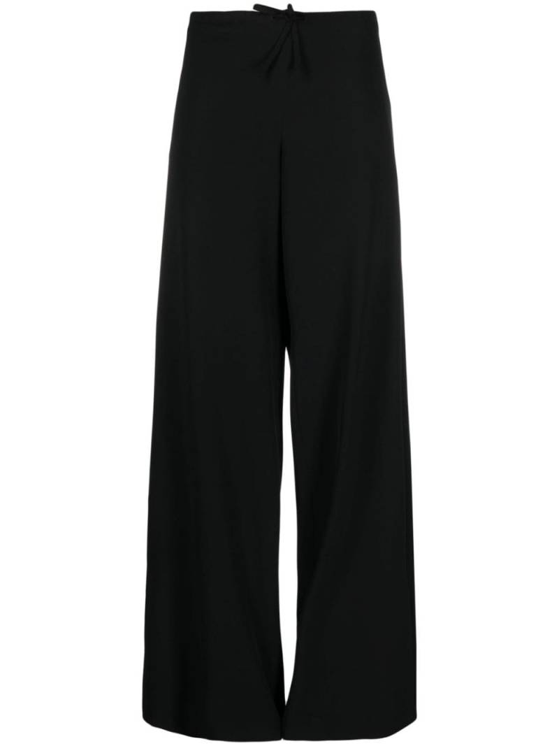 The Row Barrie wide-leg trousers - Black von The Row