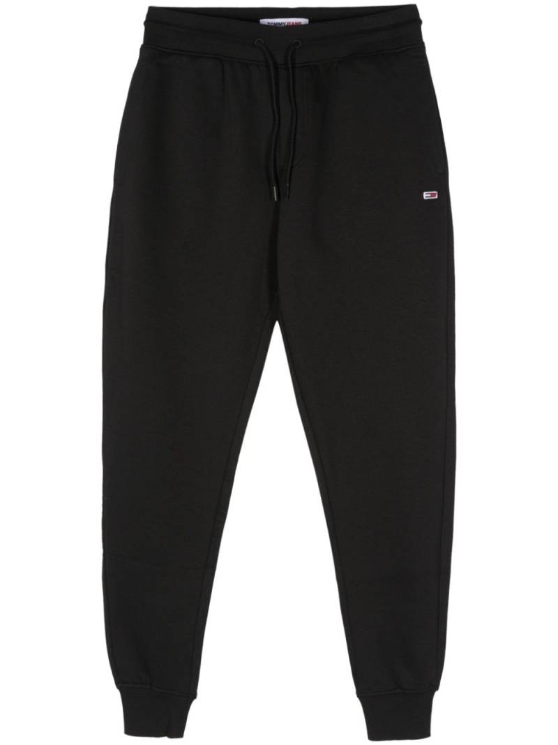 Tommy Jeans logo-patch tapered trousers - Black von Tommy Jeans