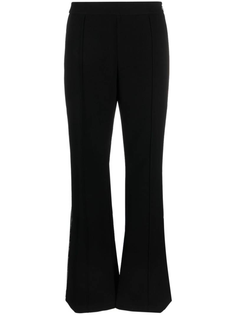 Tory Burch striped flared trousers - Black von Tory Burch