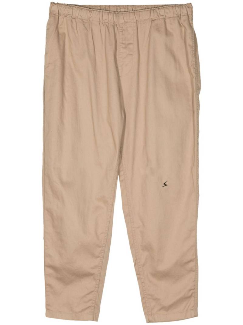 Undercover elastic-waist tapered trousers - Neutrals von Undercover