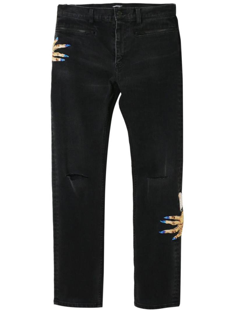 Undercover motif-embroidered straight-leg jeans - Black von Undercover