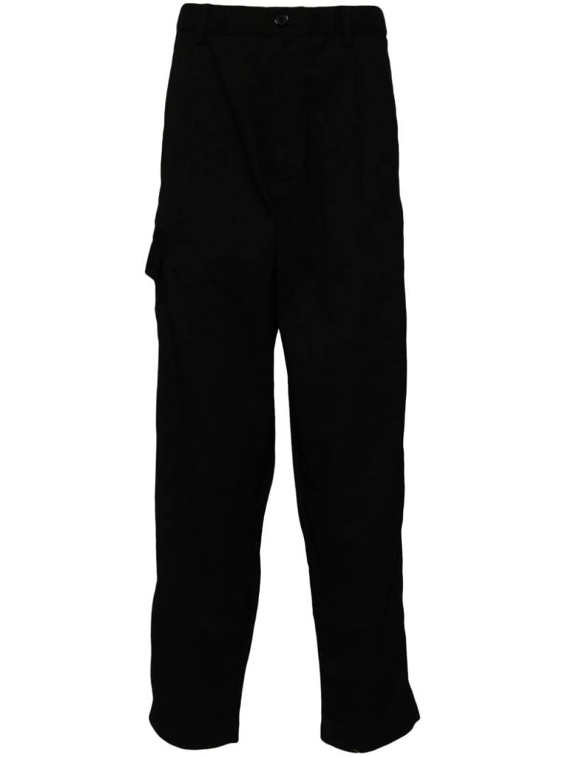 Undercover pockets tapered trousers - Black von Undercover