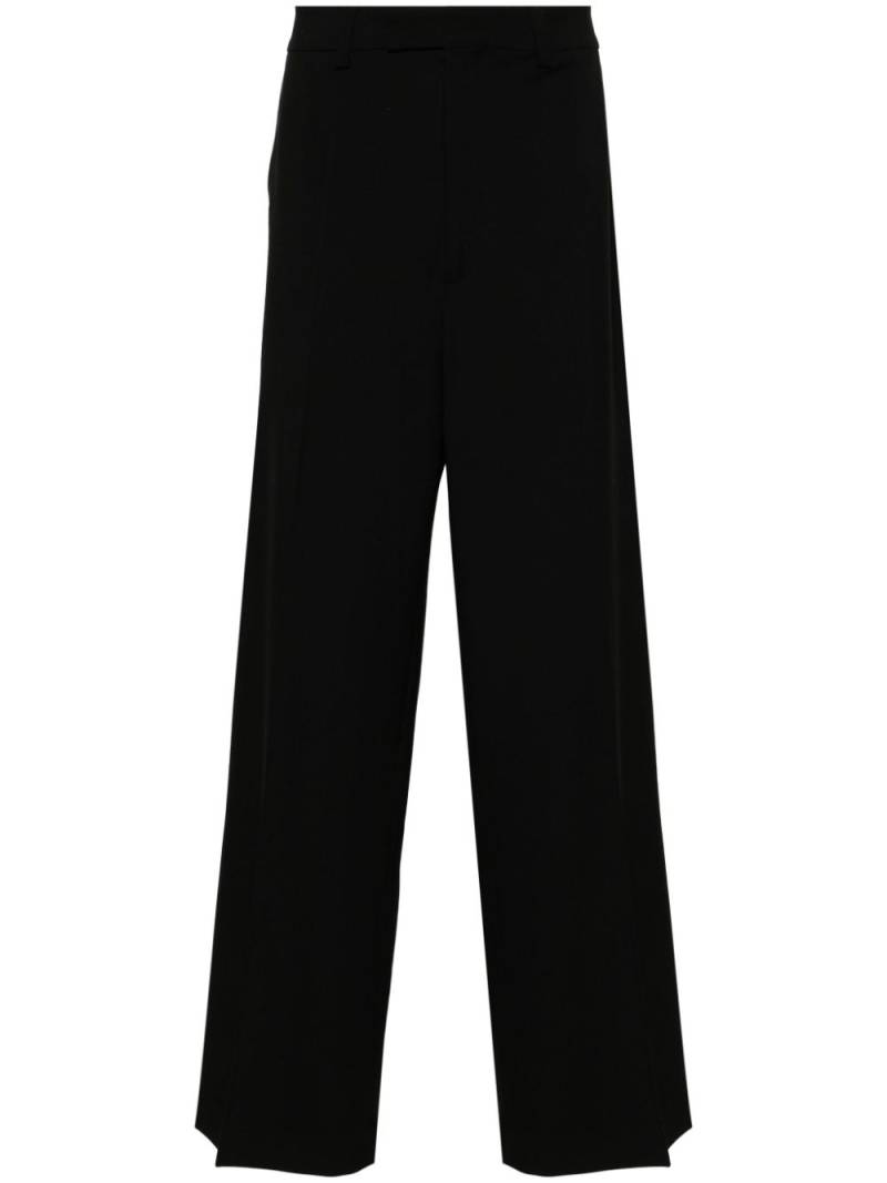 VETEMENTS high-waist wide-leg trousers - Black von VETEMENTS