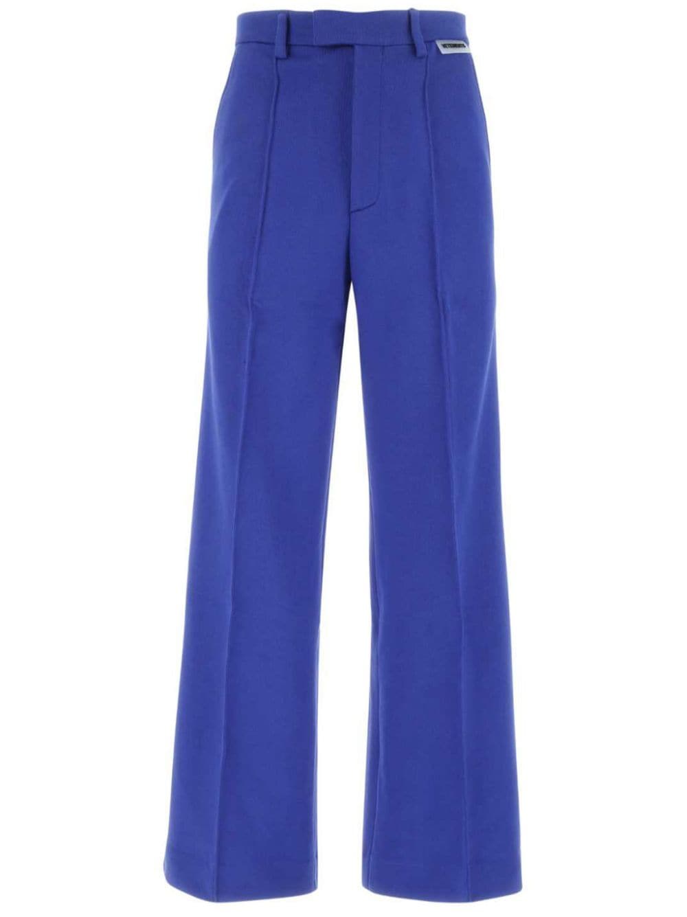 VETEMENTS logo-patch trousers - Blue von VETEMENTS