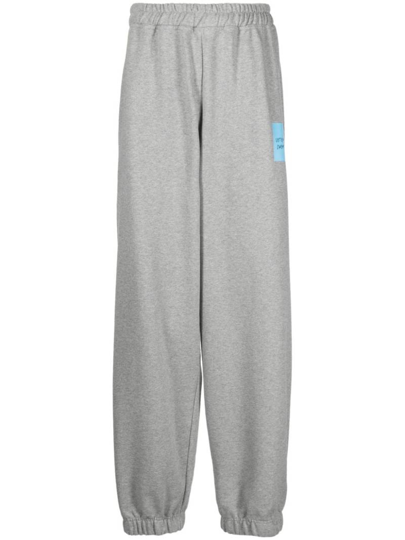 VETEMENTS logo-print wide-leg track pants - Grey von VETEMENTS