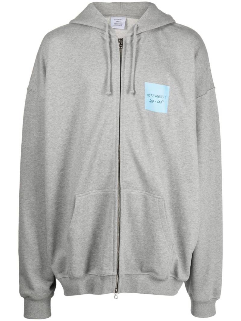 VETEMENTS logo-print zip-up hoodie - Grey von VETEMENTS