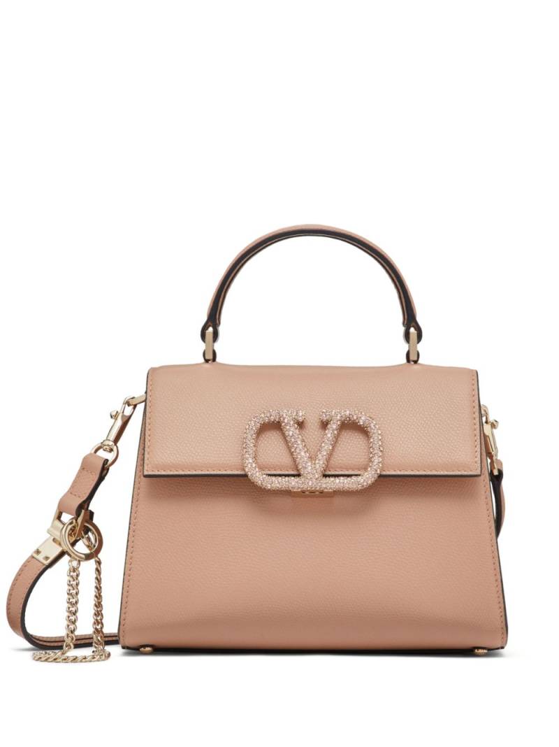 Valentino Garavani small VSling embellished handbag - Neutrals von Valentino Garavani