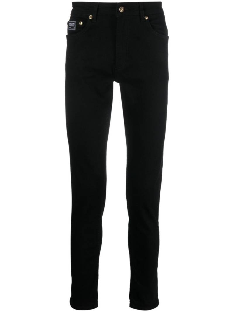 Versace Jeans Couture logo-patch cotton trousers - Black von Versace Jeans Couture