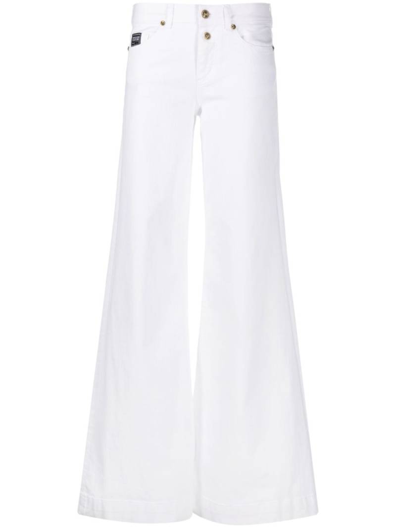 Versace Jeans Couture logo-patch wide-leg jeans - White von Versace Jeans Couture