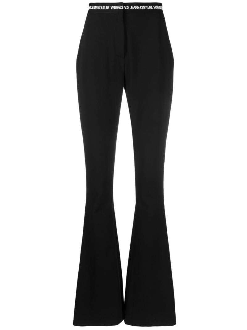 Versace Jeans Couture logo-waistband flared trousers - Black von Versace Jeans Couture