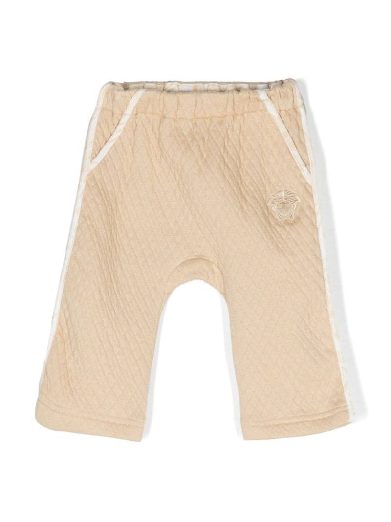 Versace Kids diamond-quilted track pants - Brown von Versace Kids