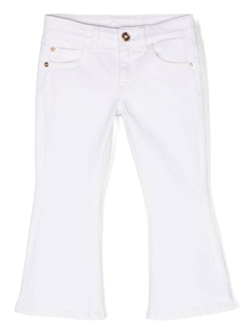 Versace Kids logo-patch flared jeans - White von Versace Kids