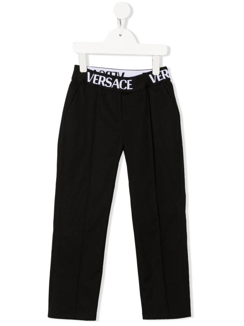 Versace Kids logo-waistband trousers - Black von Versace Kids