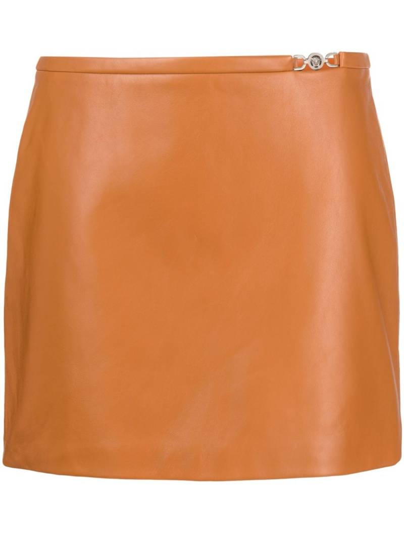 Versace Medusa-embellished leather miniskirt - Brown von Versace