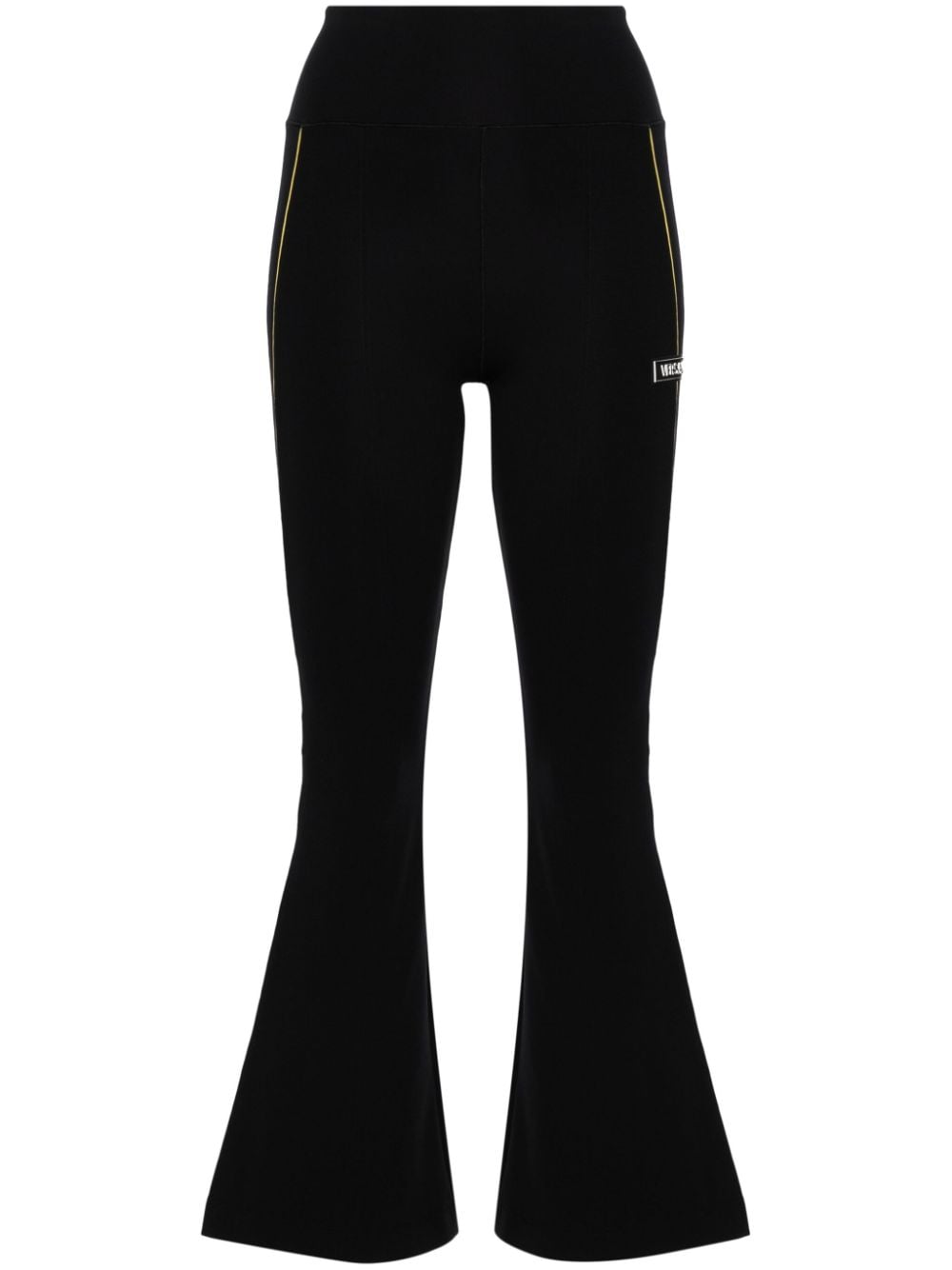 Versace logo-appliqué flared leggings - Black von Versace