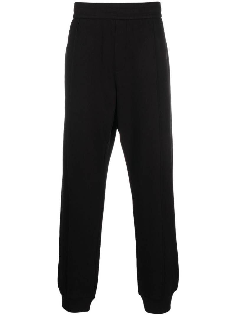 Versace logo-embroidered track pants - Black von Versace