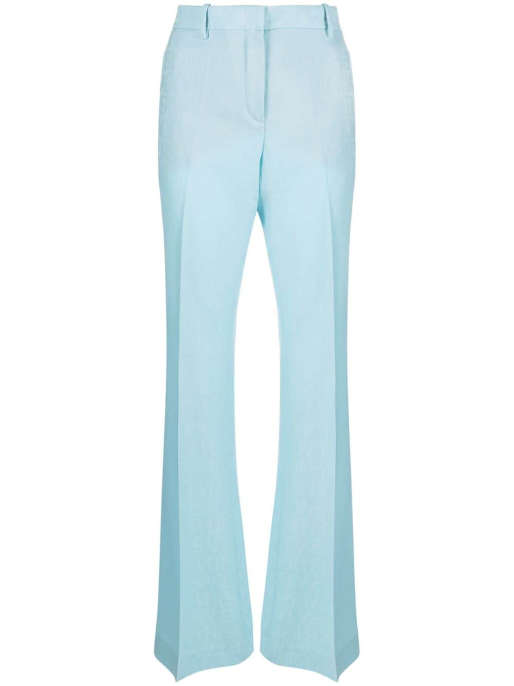 Versace Allover-jacquard flared wool trousers - Blue von Versace