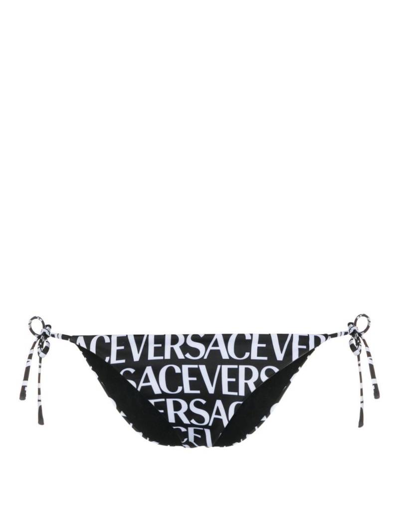 Versace logo-print tie-fastening bikini bottoms - Black von Versace