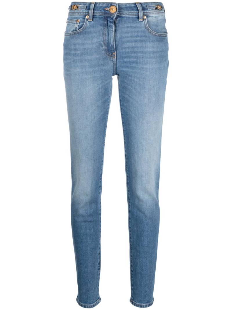 Versace low-rise Medusa Head-motif skinny jeans - Blue von Versace