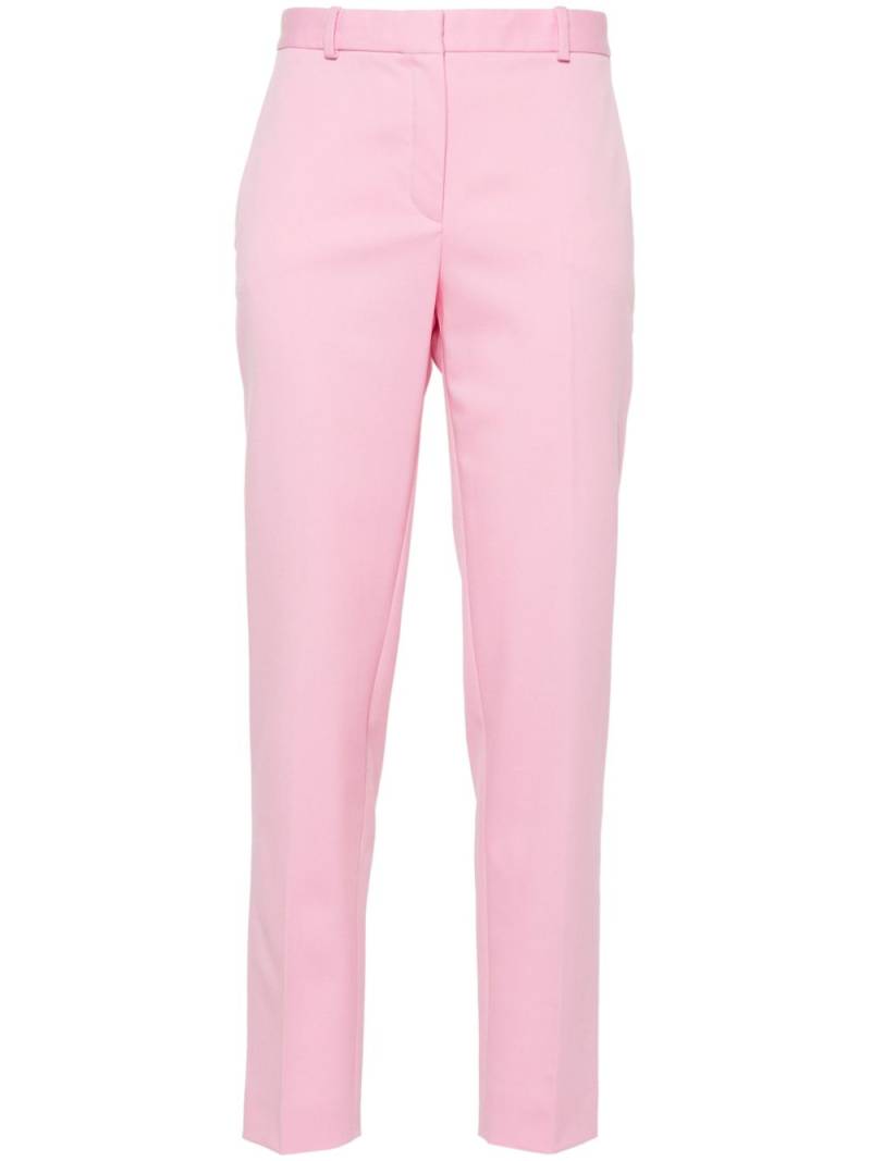 Versace pressed-crease tapered-leg trousers - Pink von Versace