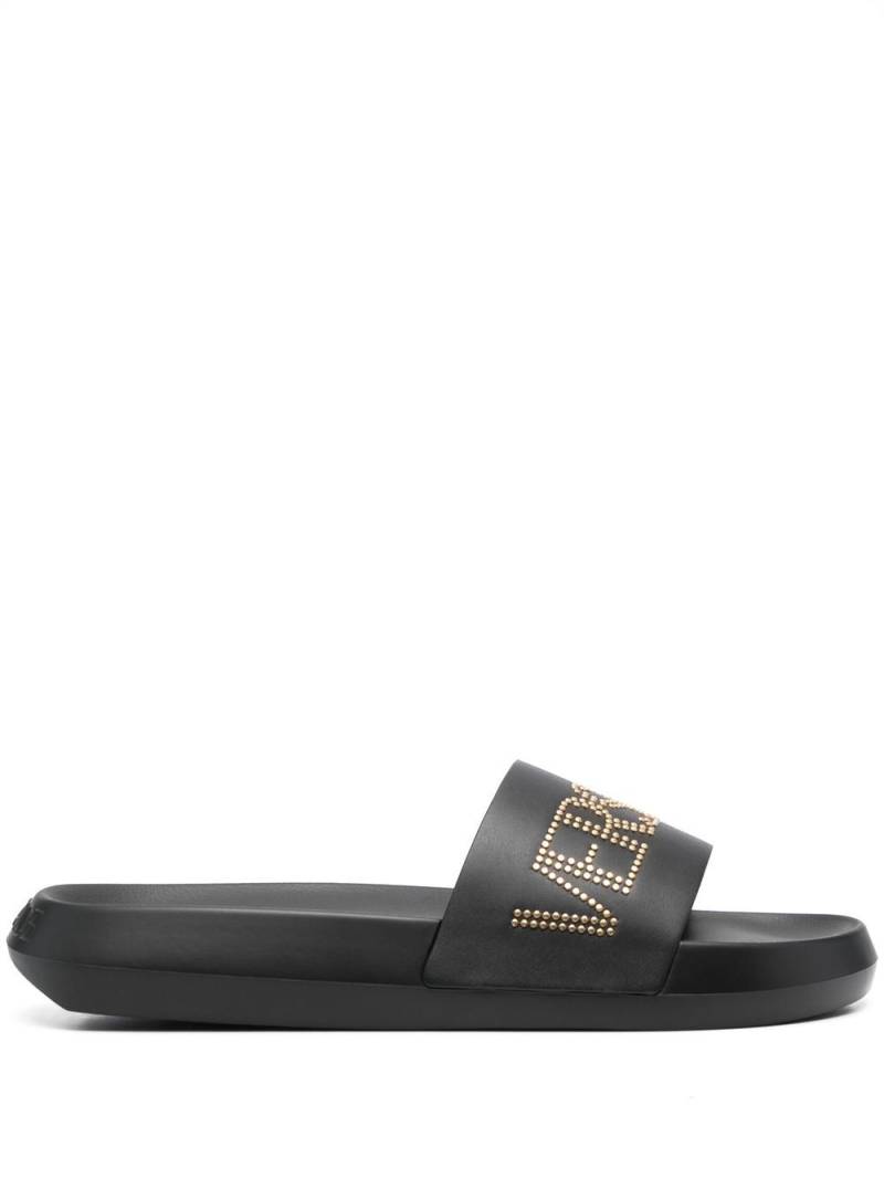 Versace studded-logo leather slides - Black von Versace