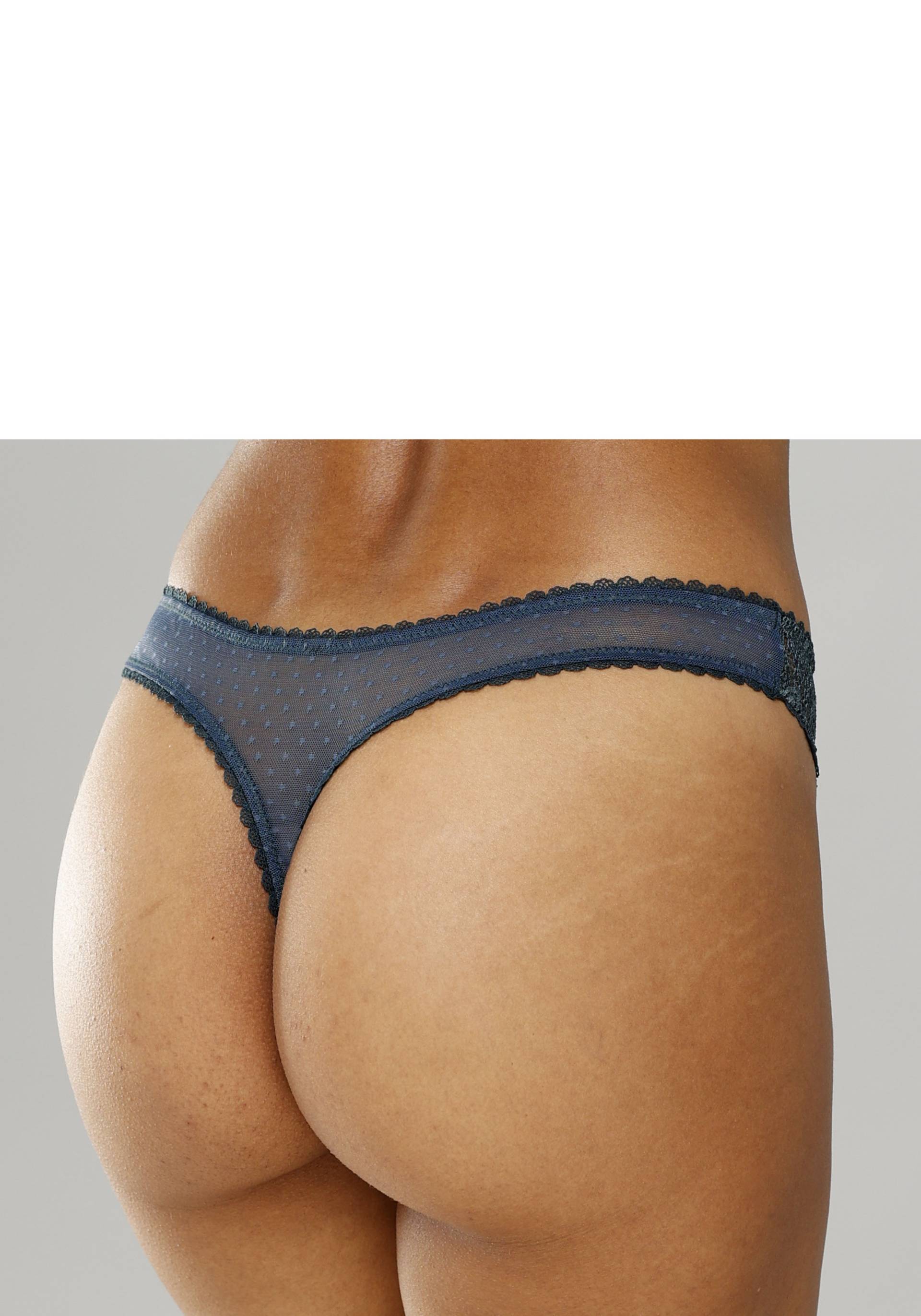 Vivance String, mit seitlichen Spitzeneinsätzen in blumiger Optik Vivance String, mit seitlichen Spitzeneinsätzen in blumiger Optik von Vivance