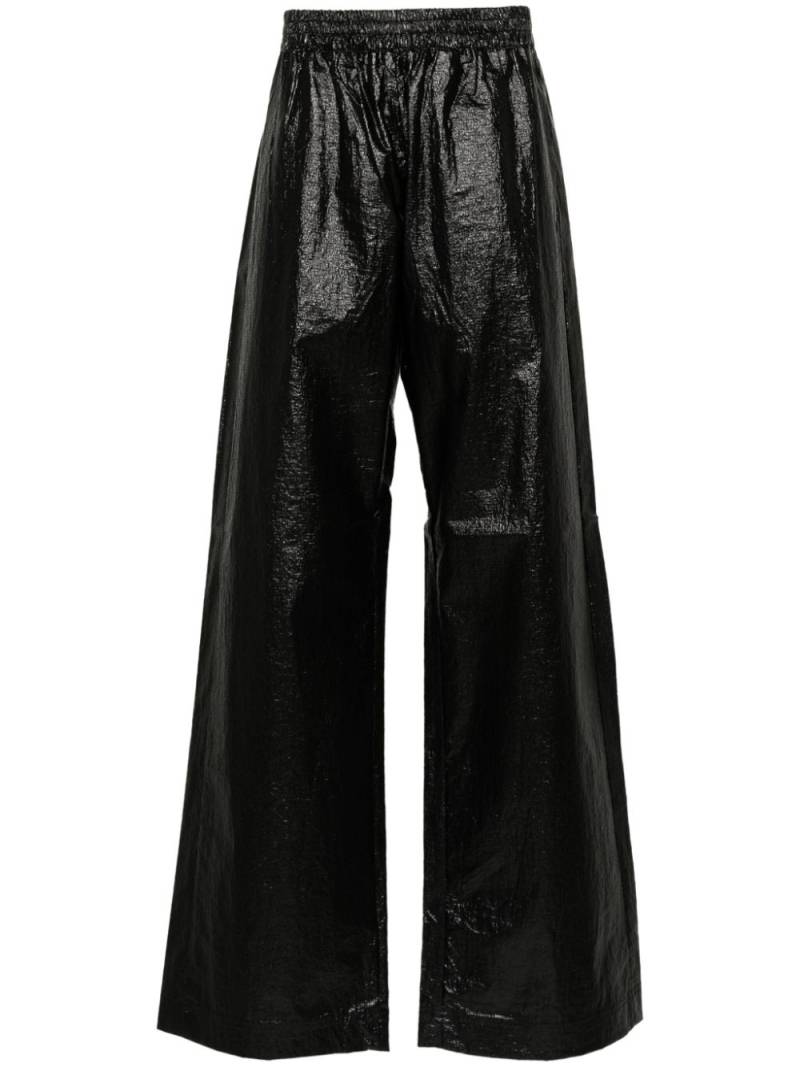 Walter Van Beirendonck embroidered-logo trousers - Black von Walter Van Beirendonck