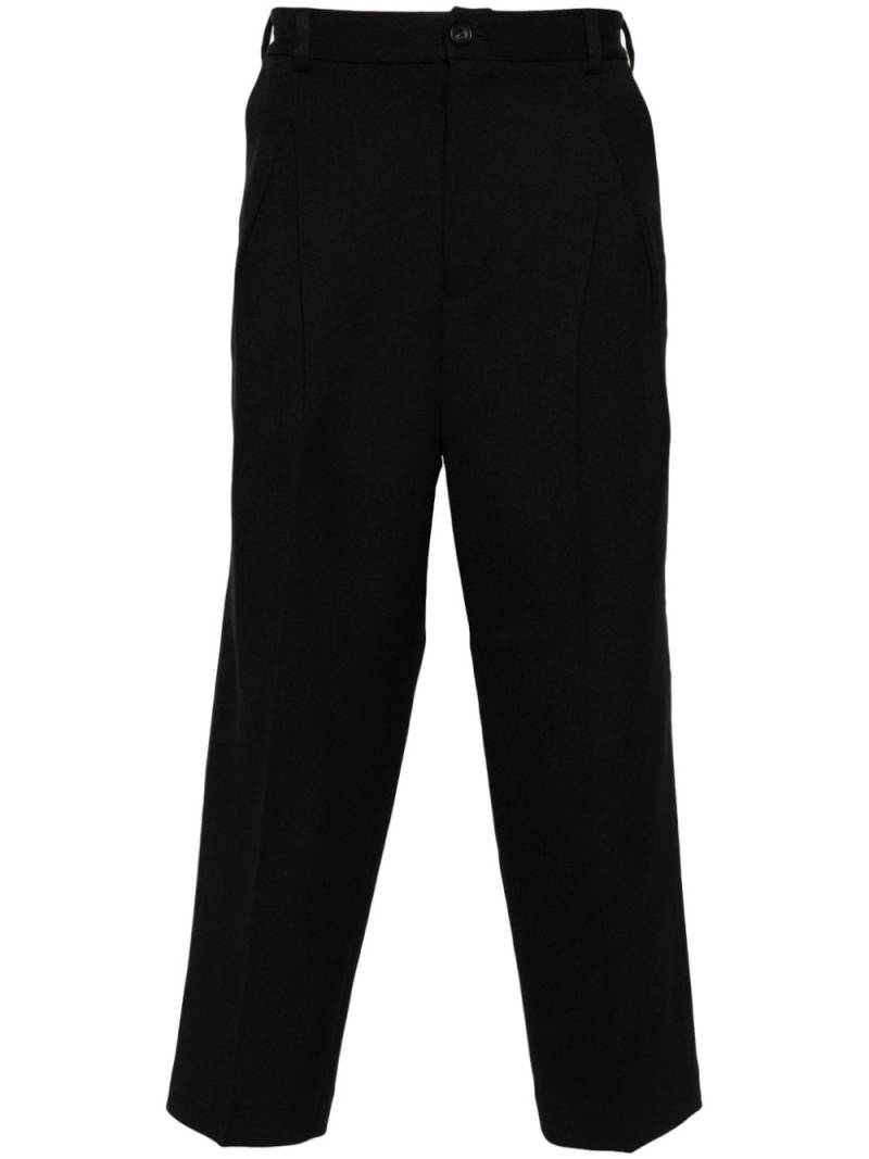 White Mountaineering button-fastening cotton tapered trousers - Black von White Mountaineering