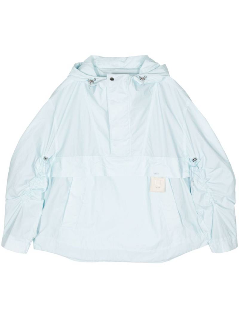 Wooyoungmi logo-patch hooded raincoat - Blue von Wooyoungmi