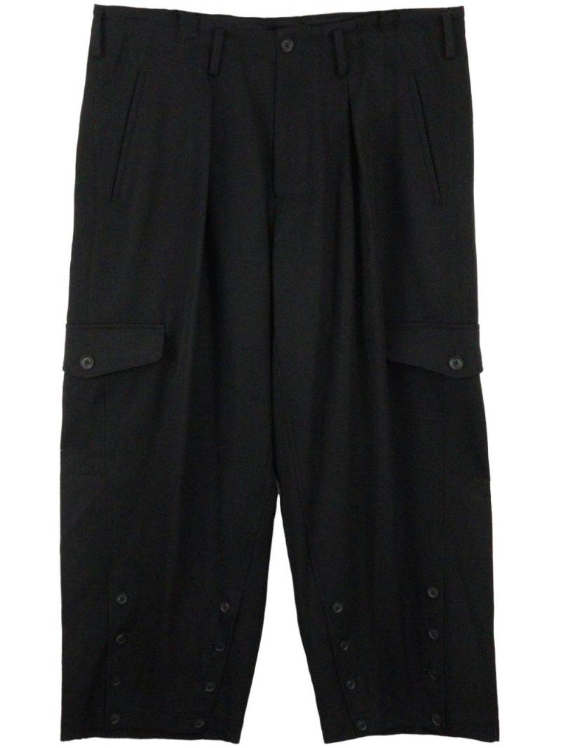 Yohji Yamamoto O-Hem drop-crotch wool trousers - Black von Yohji Yamamoto