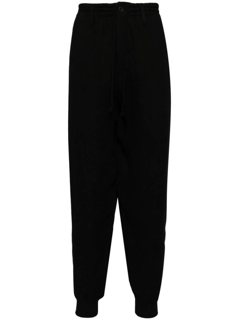 Yohji Yamamoto drop-crotch track pants - Black von Yohji Yamamoto